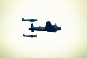 2 Supermarine Spitfires escorting a B25 bomber